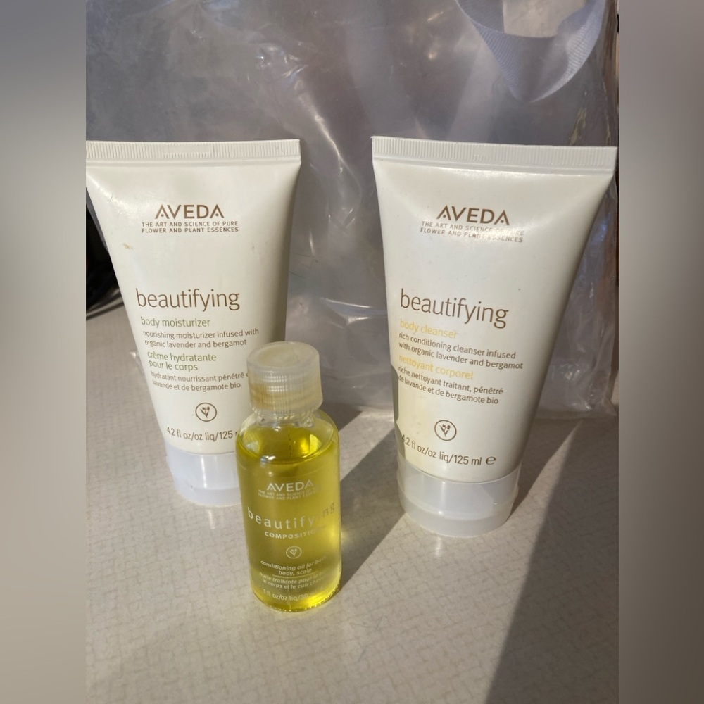 Aveda Beautifying cleanser , moisturizer and composition oil.